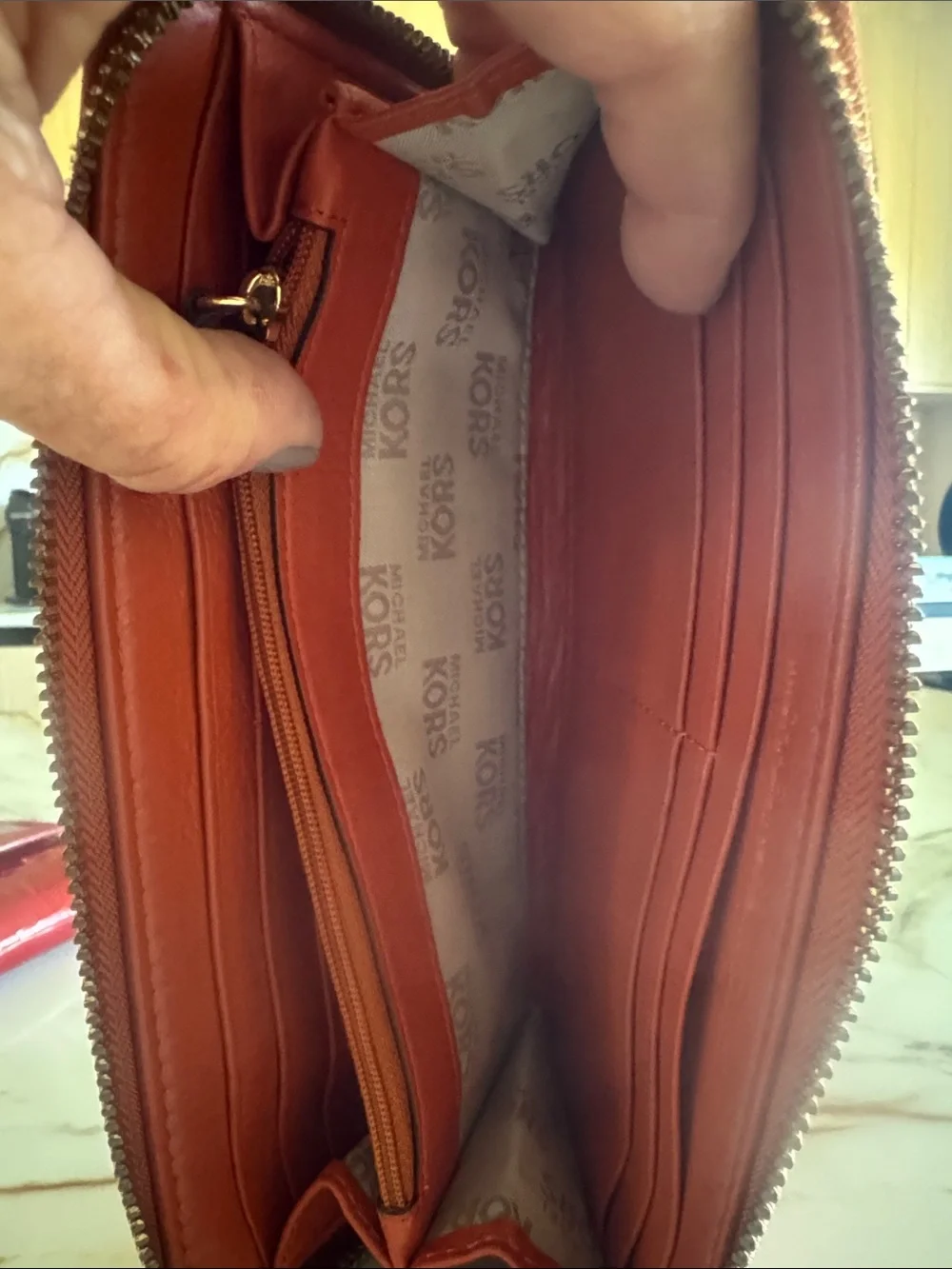 Michael Kors Brick Red Leather Zip-Around Wallet with Gold Plaque